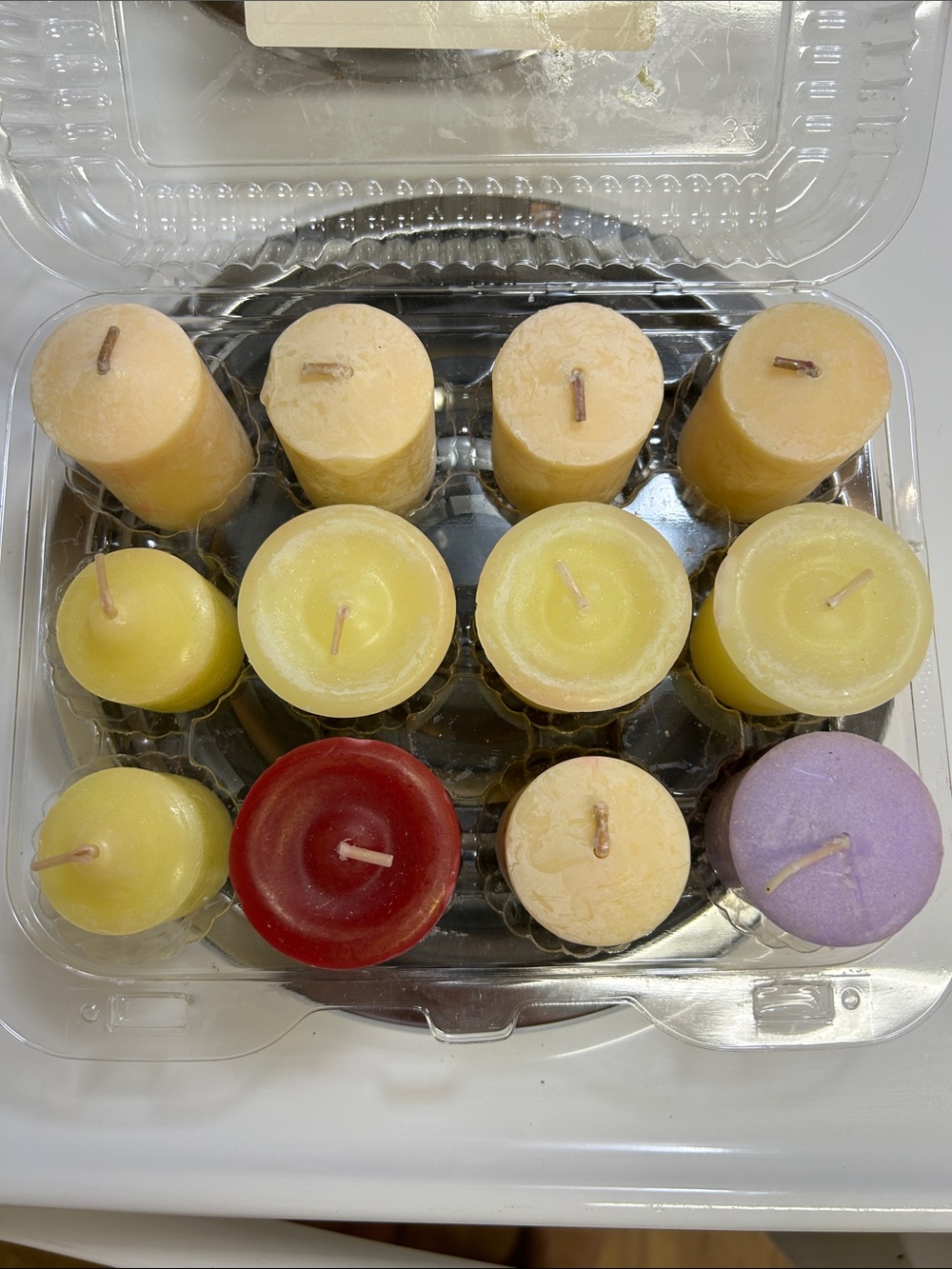 Candles in plastic tray